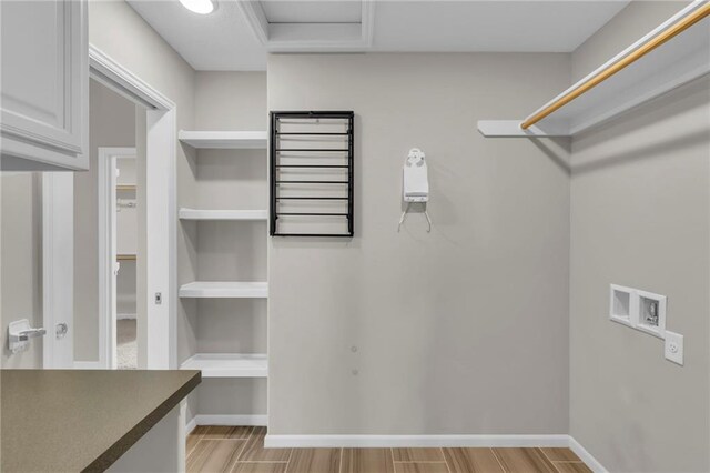 9812 Saddletop St, Lenexa, KS 66227 - spacious closet with wood tiled floors and attic access