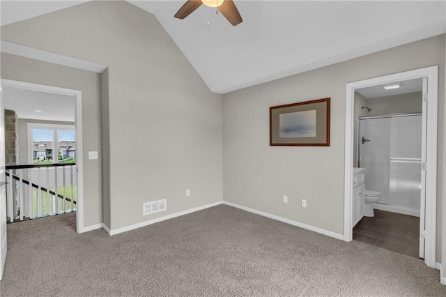 9812 Saddletop St, Lenexa, KS 66227 - unfurnished bedroom with carpet, lofted ceiling, ensuite bath, and a ceiling fan