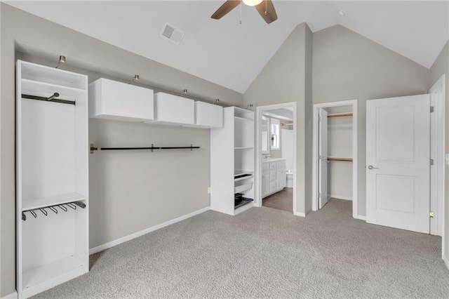 9812 Saddletop St, Lenexa, KS 66227 - unfurnished bedroom featuring high vaulted ceiling, carpet floors, ensuite bathroom, a walk in closet, and a closet