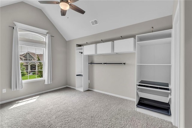 9812 Saddletop St, Lenexa, KS 66227 - unfurnished bedroom with vaulted ceiling, carpet, and a ceiling fan