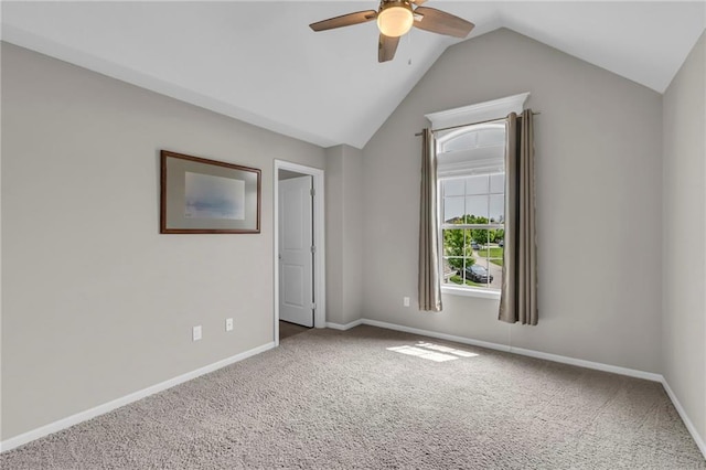9812 Saddletop St, Lenexa, KS 66227 - unfurnished bedroom with carpet flooring, vaulted ceiling, and ceiling fan