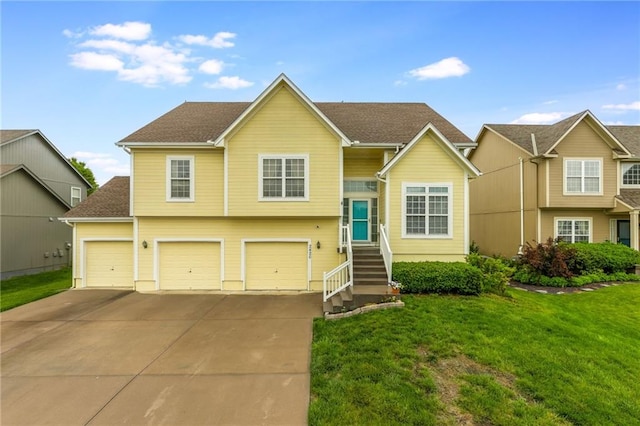 2420 SW Golden Eagle Rd, Lees Summit, MO 64082 - split level home featuring driveway, a garage, and a front yard