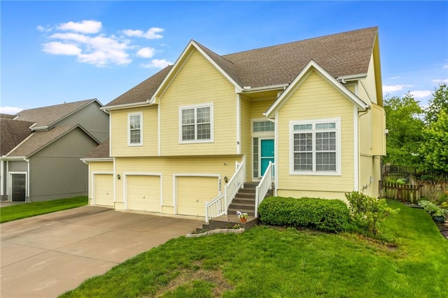 2420 SW Golden Eagle Rd, Lees Summit, MO 64082 - tri-level home with an attached garage, driveway, and roof with shingles