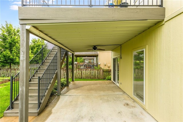 2420 SW Golden Eagle Rd, Lees Summit, MO 64082 - view of patio featuring stairway and ceiling fan