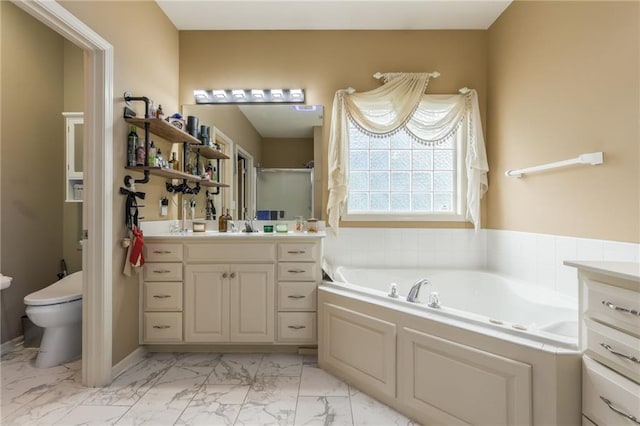 2420 SW Golden Eagle Rd, Lees Summit, MO 64082 - full bathroom featuring a bath, marble look tile flooring, vanity, toilet, and a stall shower