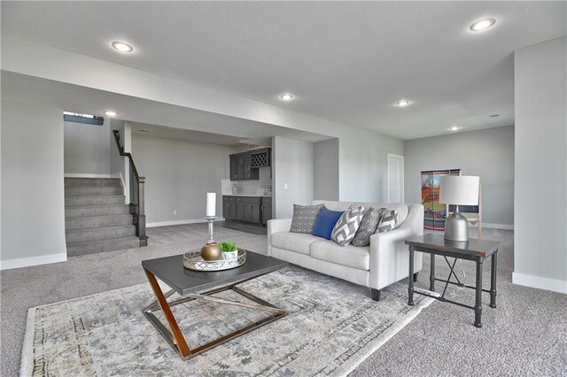 5858 Mccormick Dr, Shawnee, KS 66226 - living room featuring carpet, baseboards, stairway, and recessed lighting