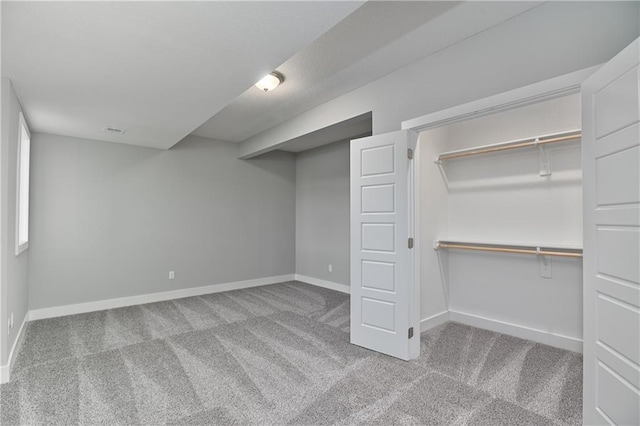 5858 Mccormick Dr, Shawnee, KS 66226 - finished below grade area featuring carpet and baseboards