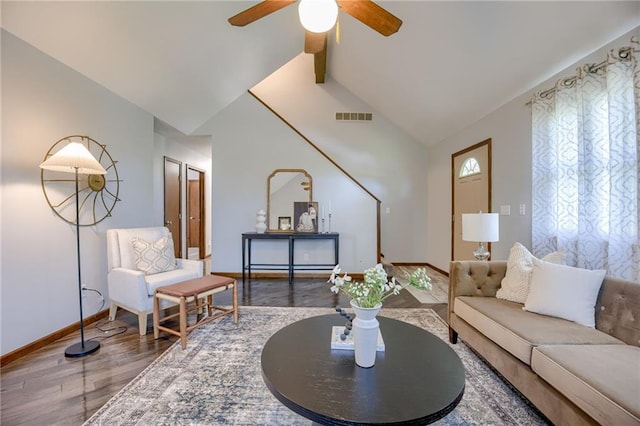 15215 Edgerton Rd, Gardner, KS 66030 - living room with ceiling fan, vaulted ceiling, baseboards, and wood finished floors