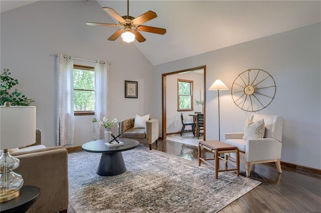 15215 Edgerton Rd, Gardner, KS 66030 - living room featuring ceiling fan, wood finished floors, high vaulted ceiling, and baseboards
