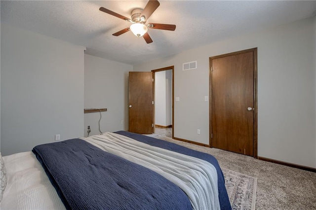 15215 Edgerton Rd, Gardner, KS 66030 - carpeted bedroom with a ceiling fan, a textured ceiling, and baseboards