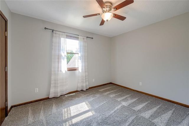 15215 Edgerton Rd, Gardner, KS 66030 - carpeted empty room featuring baseboards and a ceiling fan