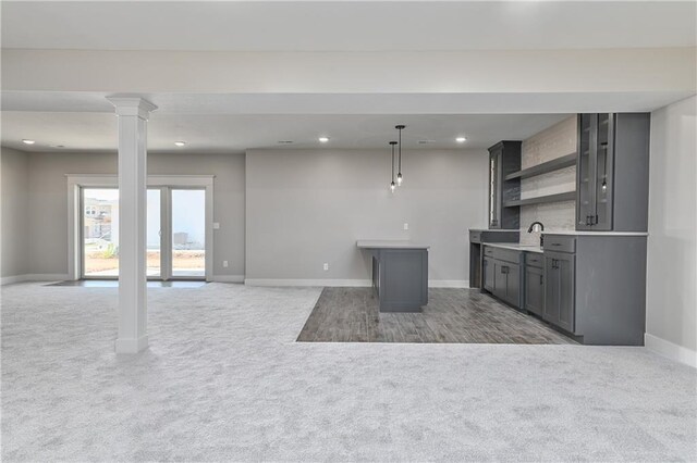 6031 Apache St, Shawnee, KS 66226 - kitchen featuring open shelves, gray cabinets, light carpet, baseboards, and recessed lighting