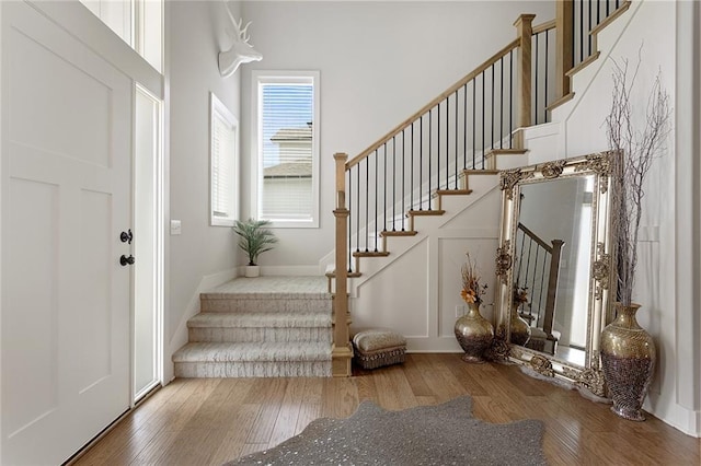 4820 NE 90th Ter, Kansas City, MO 64156 - foyer with stairs and hardwood / wood-style floors