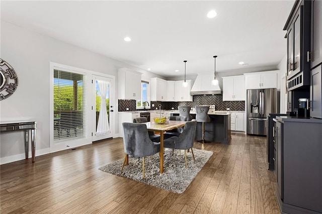 4820 NE 90th Ter, Kansas City, MO 64156 - dining area with dark wood-style flooring and recessed lighting