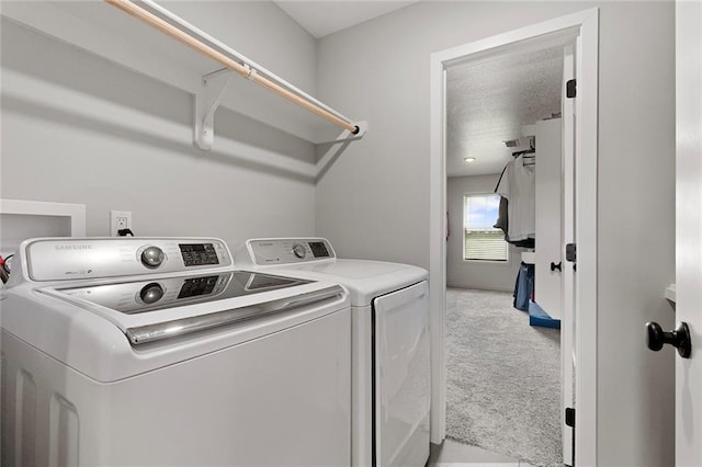 4820 NE 90th Ter, Kansas City, MO 64156 - laundry room featuring washer and clothes dryer and carpet floors