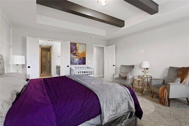 4820 NE 90th Ter, Kansas City, MO 64156 - carpeted bedroom featuring beam ceiling and ensuite bath