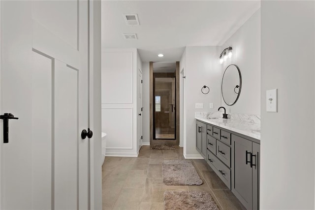4820 NE 90th Ter, Kansas City, MO 64156 - bathroom with double vanity, a freestanding tub, and a stall shower