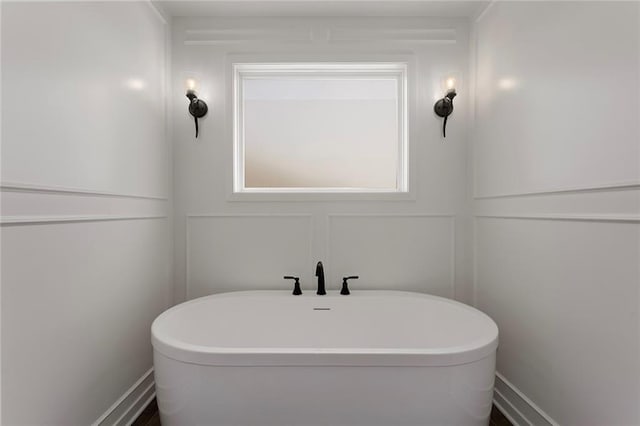 4820 NE 90th Ter, Kansas City, MO 64156 - full bathroom with a freestanding tub