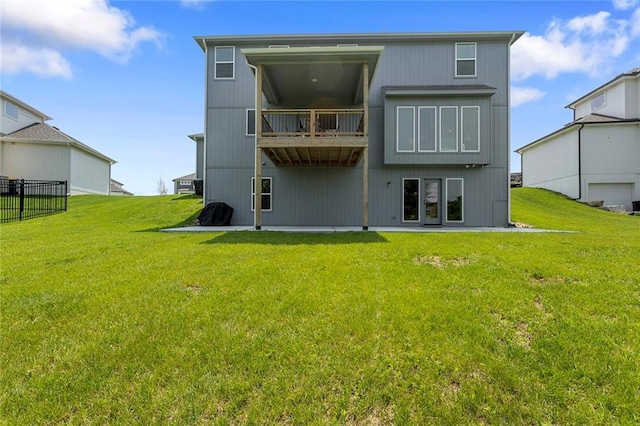 4820 NE 90th Ter, Kansas City, MO 64156 - rear view of property with a balcony