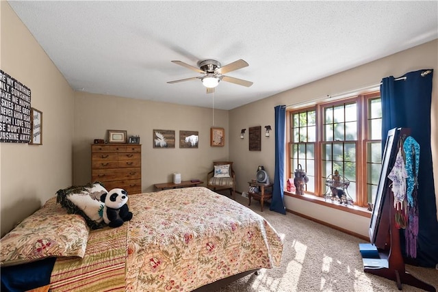 513 Brown Circle Dr, Osawatomie, KS 66064 - bedroom featuring carpet, a ceiling fan, and a textured ceiling