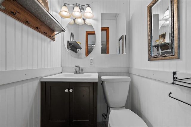 513 Brown Circle Dr, Osawatomie, KS 66064 - bathroom featuring vanity and a decorative wall