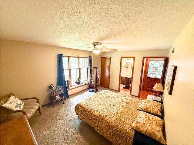 513 Brown Circle Dr, Osawatomie, KS 66064 - bedroom with carpet floors, a textured ceiling, a ceiling fan, and ensuite bath
