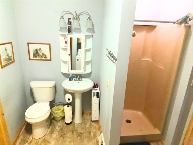 513 Brown Circle Dr, Osawatomie, KS 66064 - bathroom with a stall shower and toilet