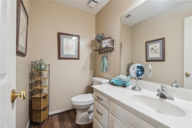 2436 SW Current Ln, Lees Summit, MO 64082 - bathroom featuring vanity and wood finished floors