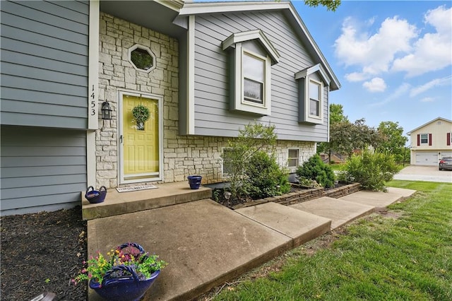 1453 Madison St, Lees Summit, MO 64081 - doorway to property featuring stone siding
