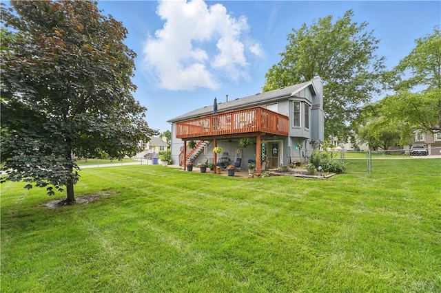 1453 Madison St, Lees Summit, MO 64081 - back of house featuring stairway, a wooden deck, and a chimney