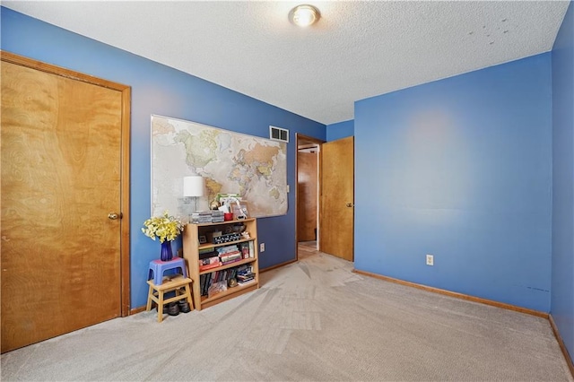 1453 Madison St, Lees Summit, MO 64081 - bedroom featuring carpet floors, a textured ceiling, and baseboards