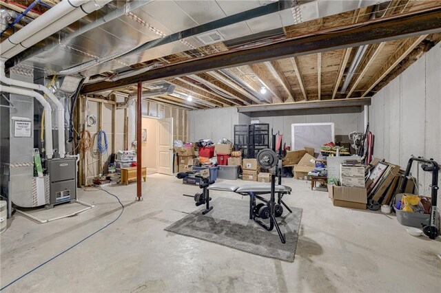 807 N Whispering Hills Dr, Lone Jack, MO 64070 - unfinished below grade area with heating unit