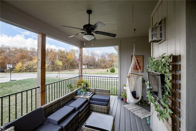 807 N Whispering Hills Dr, Lone Jack, MO 64070 - porch with a ceiling fan and a lawn