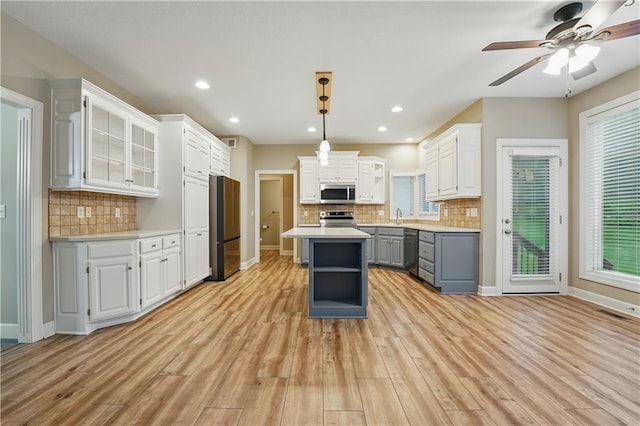 4904 W 162nd St, Overland Park, KS 66085 - kitchen featuring gray cabinetry, stainless steel appliances, light countertops, white cabinetry, and recessed lighting