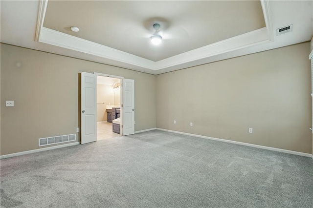 4904 W 162nd St, Overland Park, KS 66085 - empty room with a raised ceiling, light carpet, crown molding, ceiling fan, and baseboards