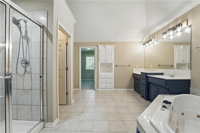 4904 W 162nd St, Overland Park, KS 66085 - full bathroom with vanity, a stall shower, a jetted tub, baseboards, and tile patterned flooring