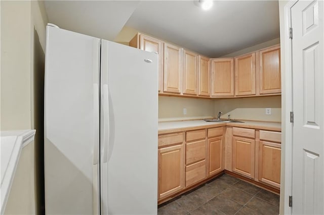 4904 W 162nd St, Overland Park, KS 66085 - kitchen with freestanding refrigerator, light brown cabinetry, a sink, and light countertops