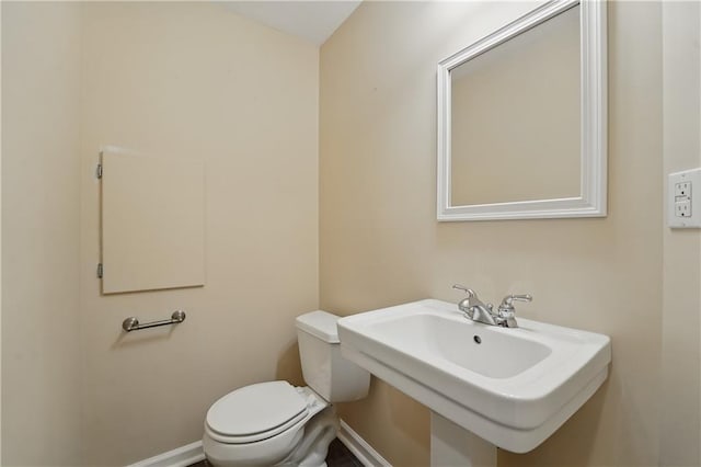 4904 W 162nd St, Overland Park, KS 66085 - half bathroom featuring toilet and a sink
