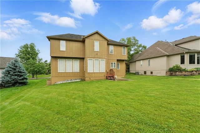 4904 W 162nd St, Overland Park, KS 66085 - back of property with a yard and stucco siding