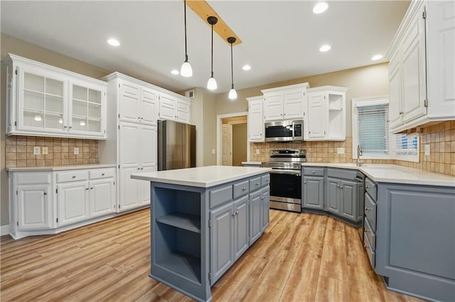4904 W 162nd St, Overland Park, KS 66085 - kitchen with gray cabinets, open shelves, appliances with stainless steel finishes, white cabinetry, and recessed lighting