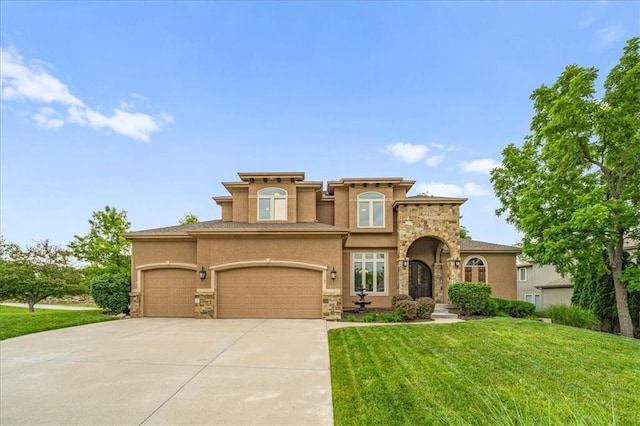 11121 S Whitetail Ln, Olathe, KS 66061 - mediterranean / spanish home featuring stone siding, driveway, a front yard, stucco siding, and an attached garage