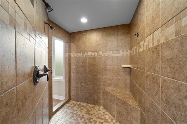 11121 S Whitetail Ln, Olathe, KS 66061 - bathroom with tiled shower, tile patterned floors, and recessed lighting