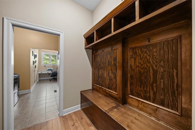 11121 S Whitetail Ln, Olathe, KS 66061 - mudroom featuring baseboards and light wood-type flooring
