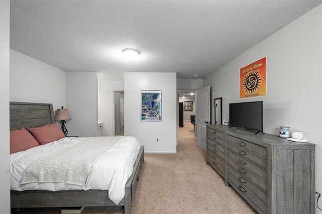 11121 S Whitetail Ln, Olathe, KS 66061 - bedroom featuring light carpet and a textured ceiling