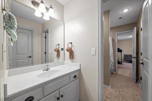 11121 S Whitetail Ln, Olathe, KS 66061 - bathroom featuring vanity and tile patterned floors