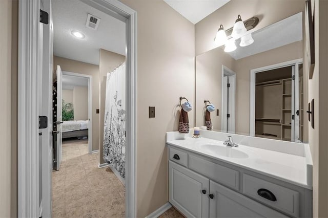 11121 S Whitetail Ln, Olathe, KS 66061 - bathroom with vanity and baseboards