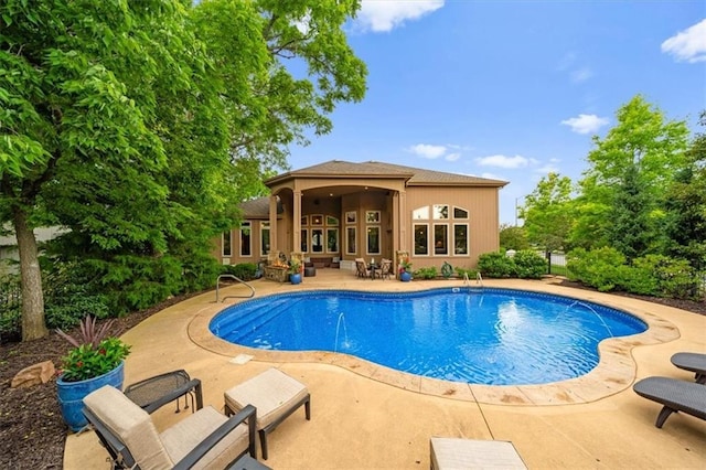 11121 S Whitetail Ln, Olathe, KS 66061 - outdoor pool featuring a patio area