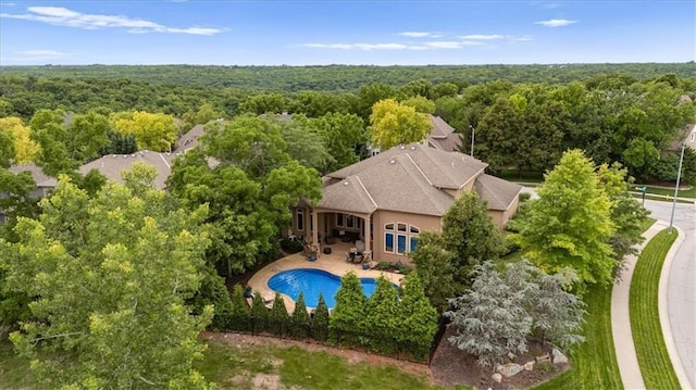 11121 S Whitetail Ln, Olathe, KS 66061 - view of subject property featuring a heavily wooded area