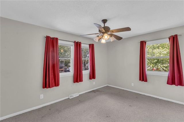 531 S Oak St, Gardner, KS 66030 - carpeted spare room with plenty of natural light, a ceiling fan, and baseboards