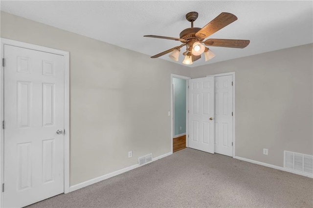 531 S Oak St, Gardner, KS 66030 - unfurnished bedroom featuring carpet, baseboards, and a ceiling fan